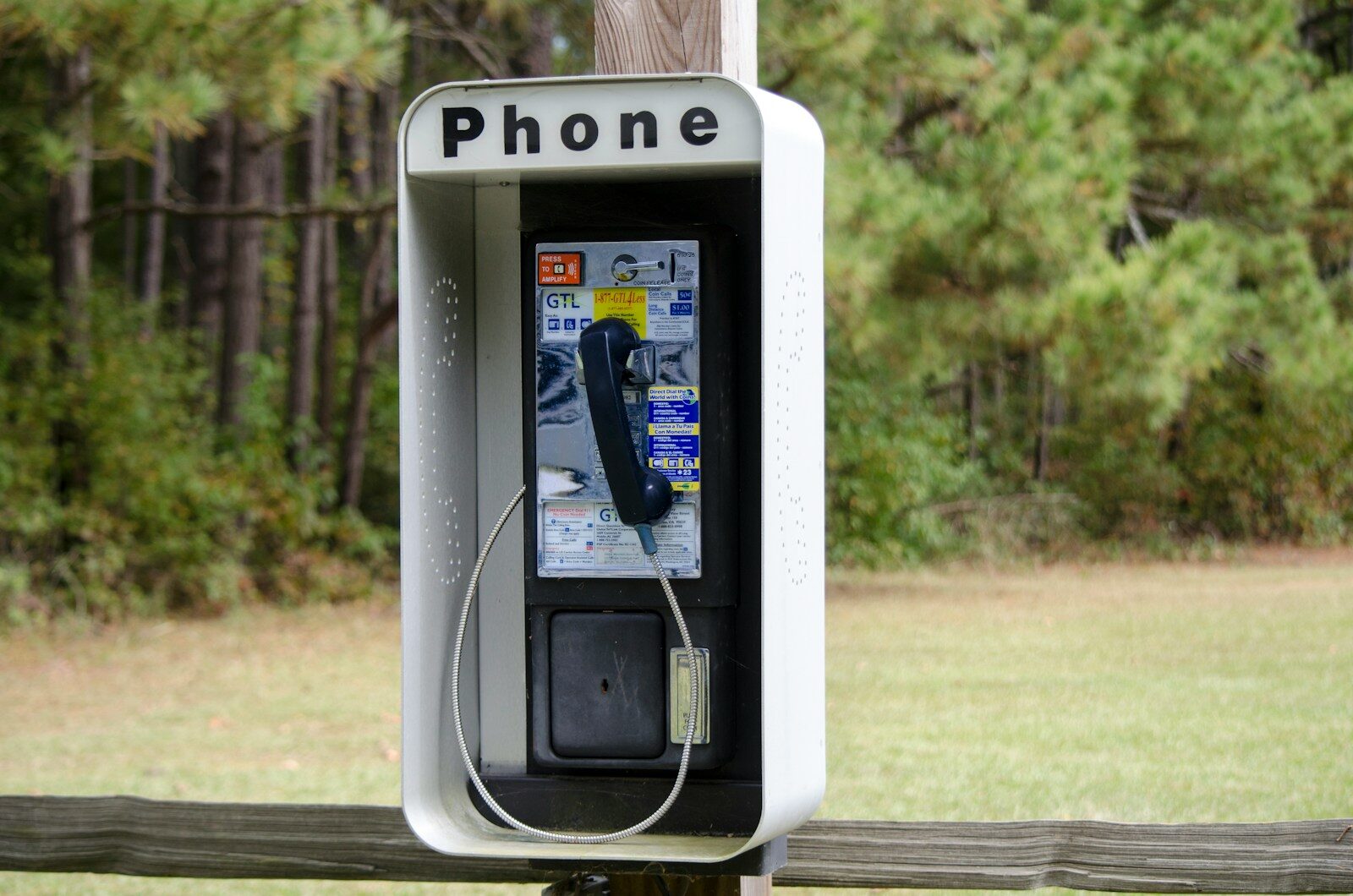 silver and black telephone booth
